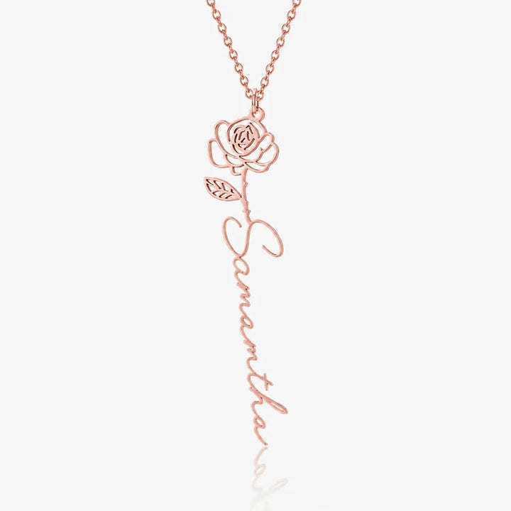 Personalized birth flower name necklace in rose gold on white background