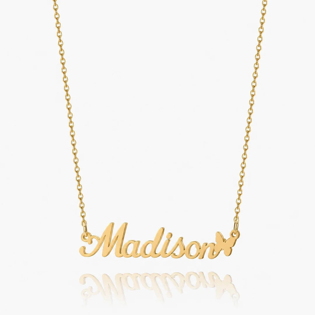 Personalized butterfly name necklace in gold on white background
