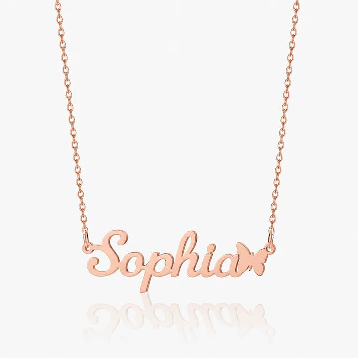 Personalized butterfly name necklace in rose gold on white background
