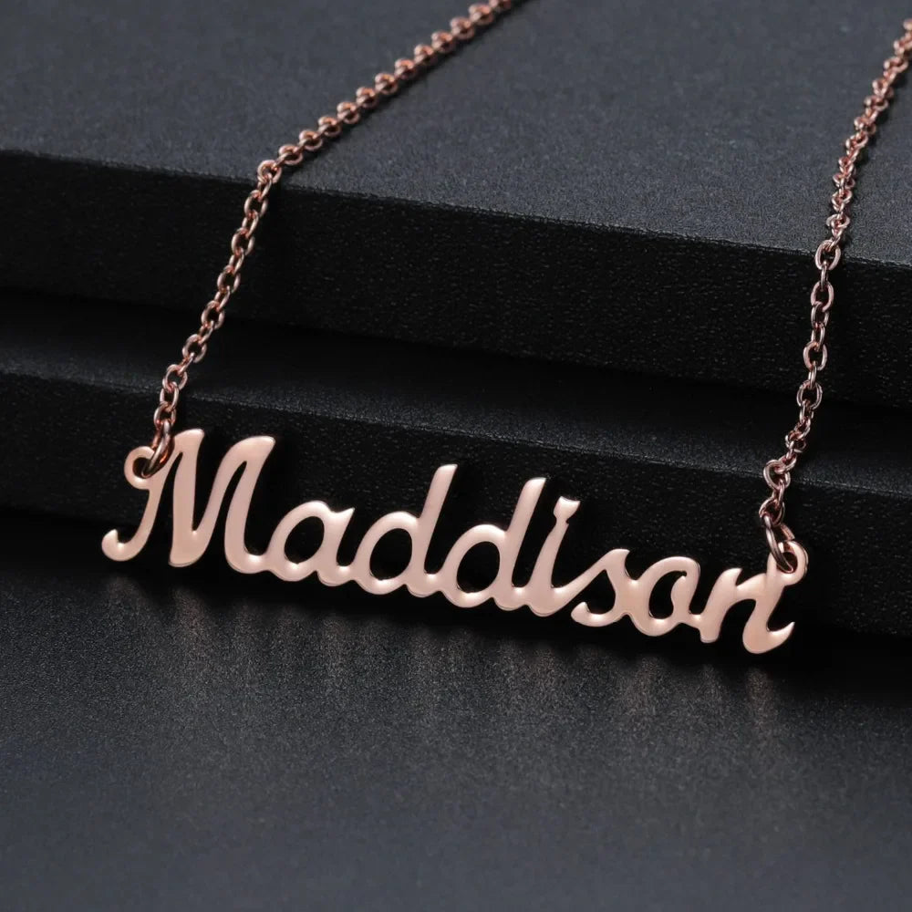 Rose gold custom name necklace with "Maddison" inscription.