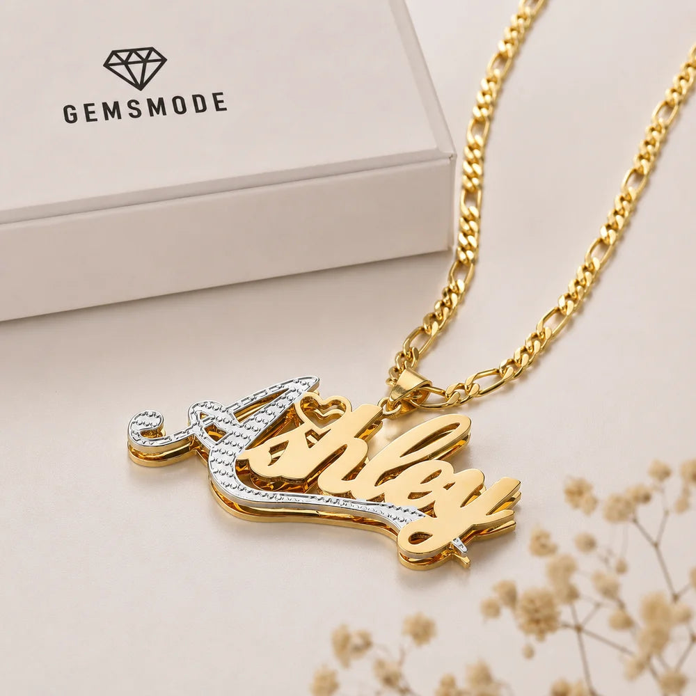 Double Plated First Letter Name Necklace in Gold on gift box personalized with the name "Ashley"