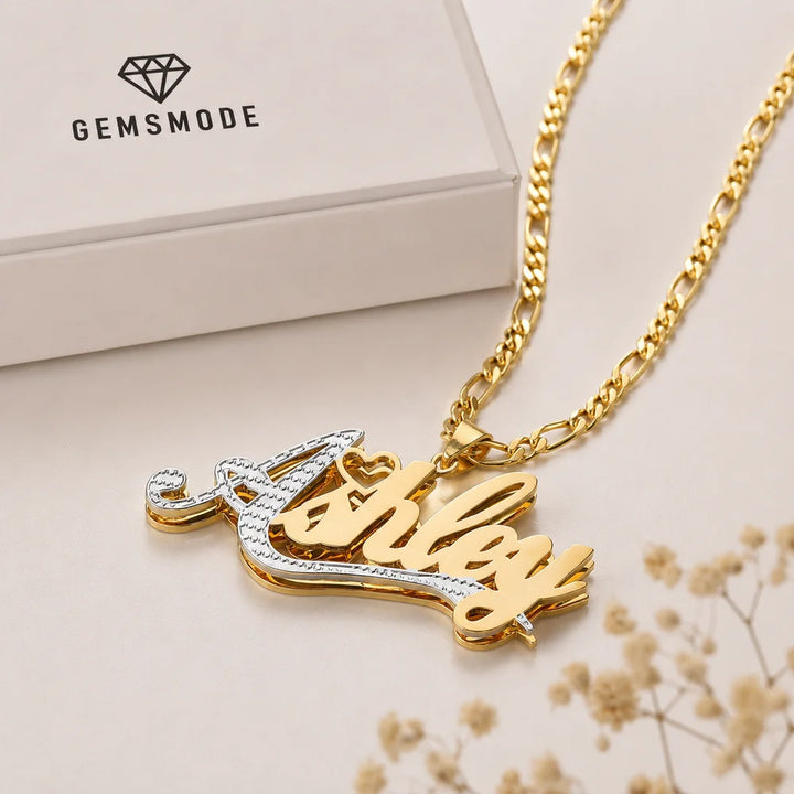 Double Plated First Letter Name Necklace in Gold on gift box personalized with the name "Ashley"