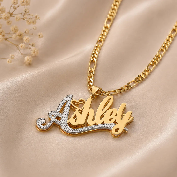 Closeup of Double Plated First Letter Name Necklace in Gold personalized with the name "Ashley"