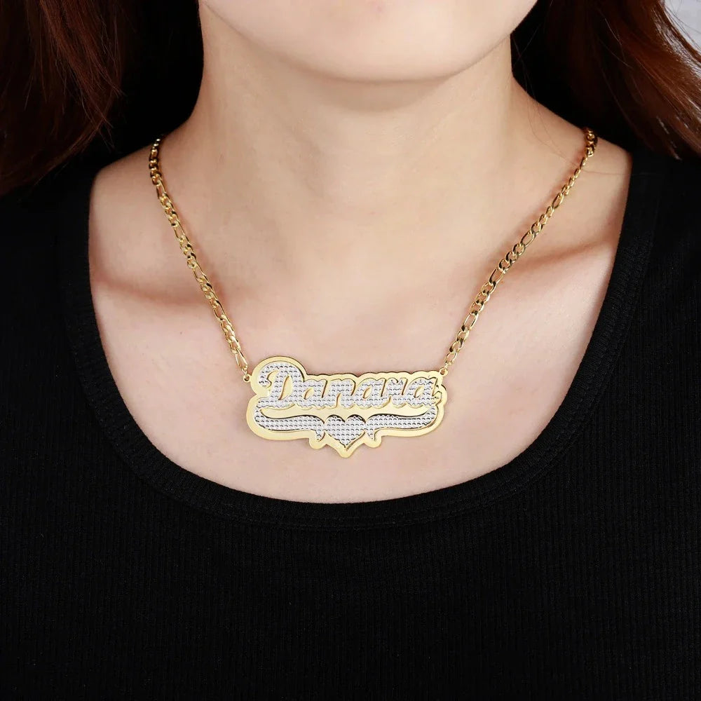 Model wearing Double plated layered name necklace in gold with Figaro Chain