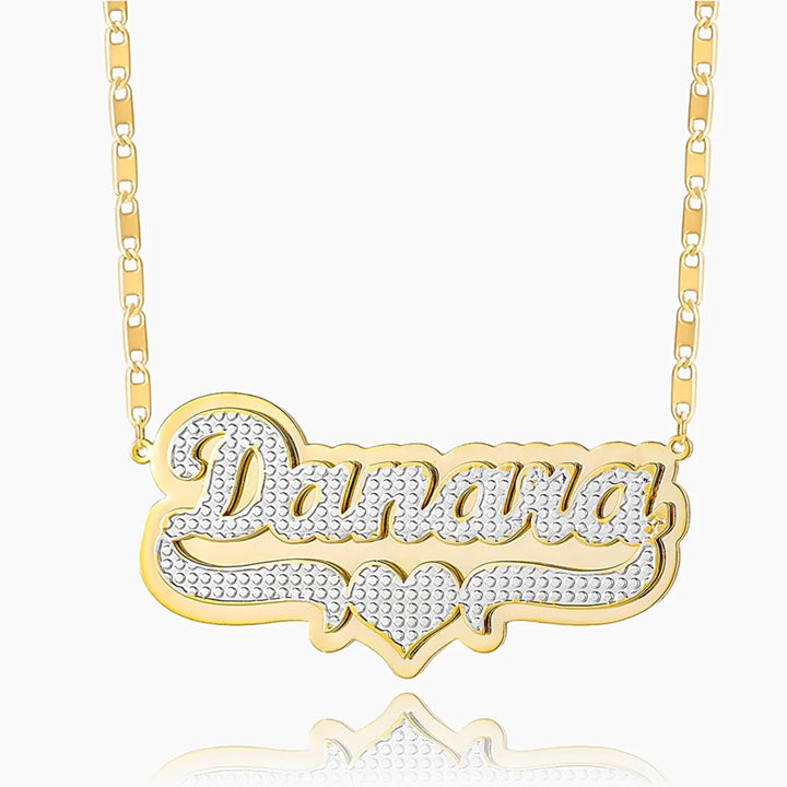 Double plated layered name necklace in gold on white background