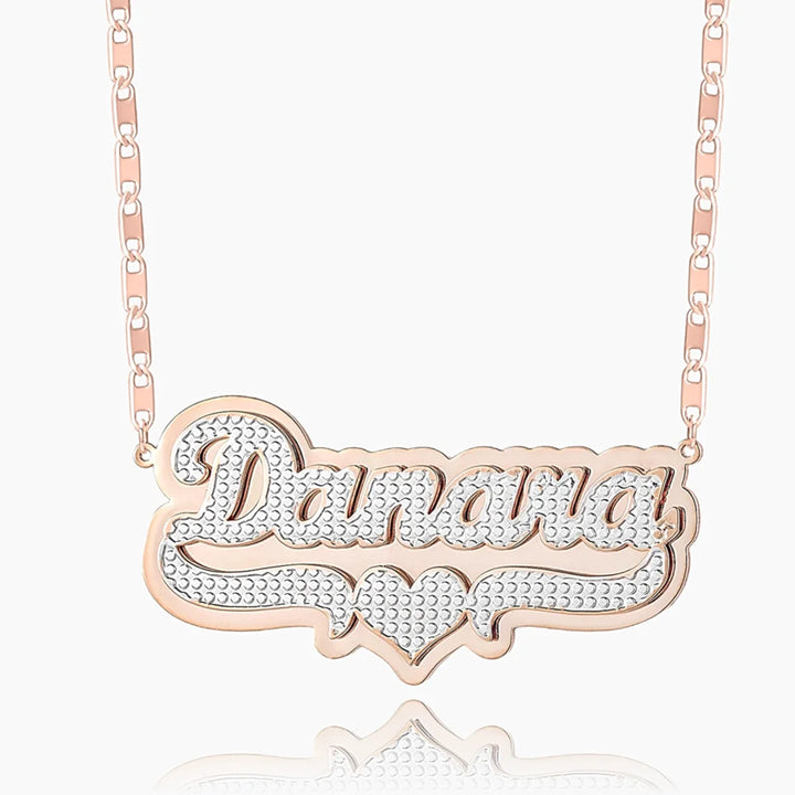 Double plated layered name necklace in rose gold on white background