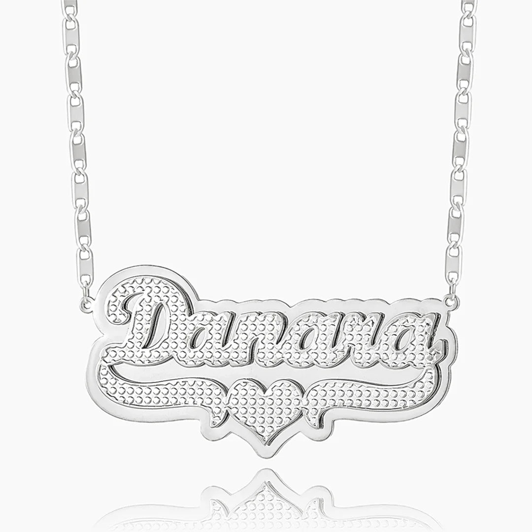 Double plated layered name necklace in silver on white background