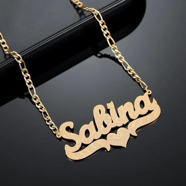 Angled view of Frosted Heart Custom Name Necklace in gold