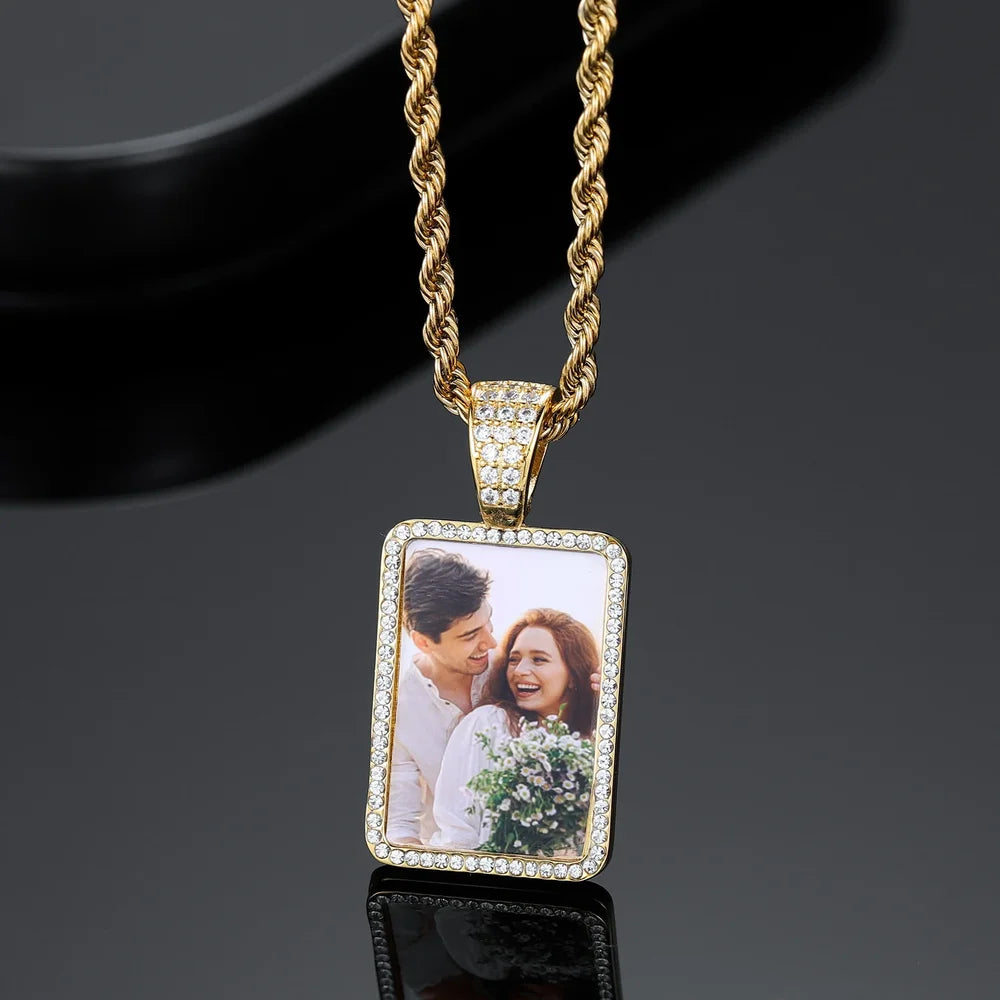 Display of Gold Iced Out Rectangle Photo Pendant Necklace