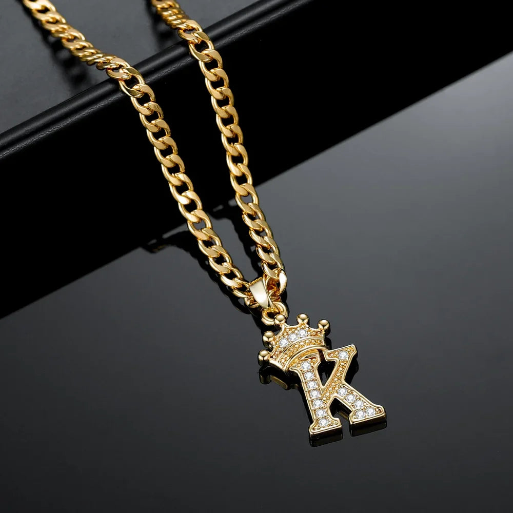 Angle view of gold Iced Crown Initial Necklace with Cuban Chain.