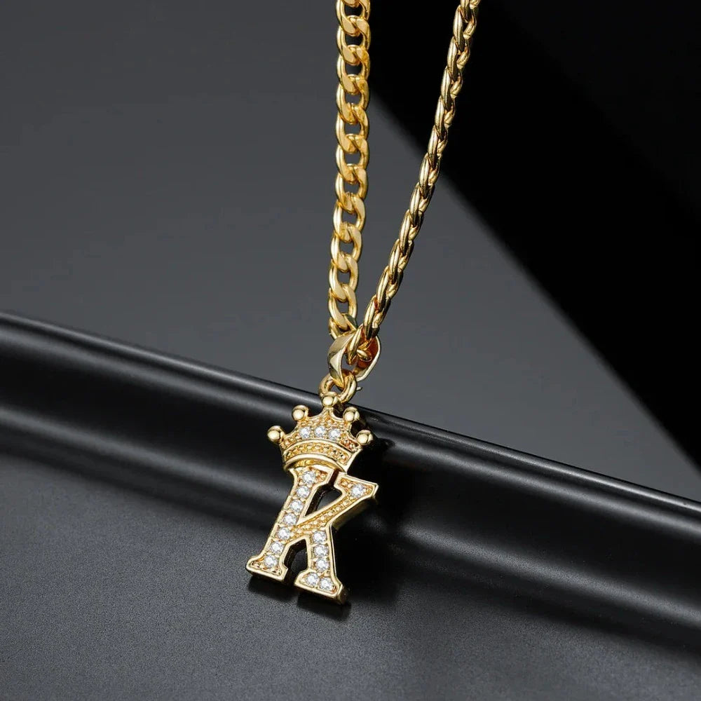 Detailed close-up of gold Iced Crown Initial Necklace showing intricate craftsmanship.