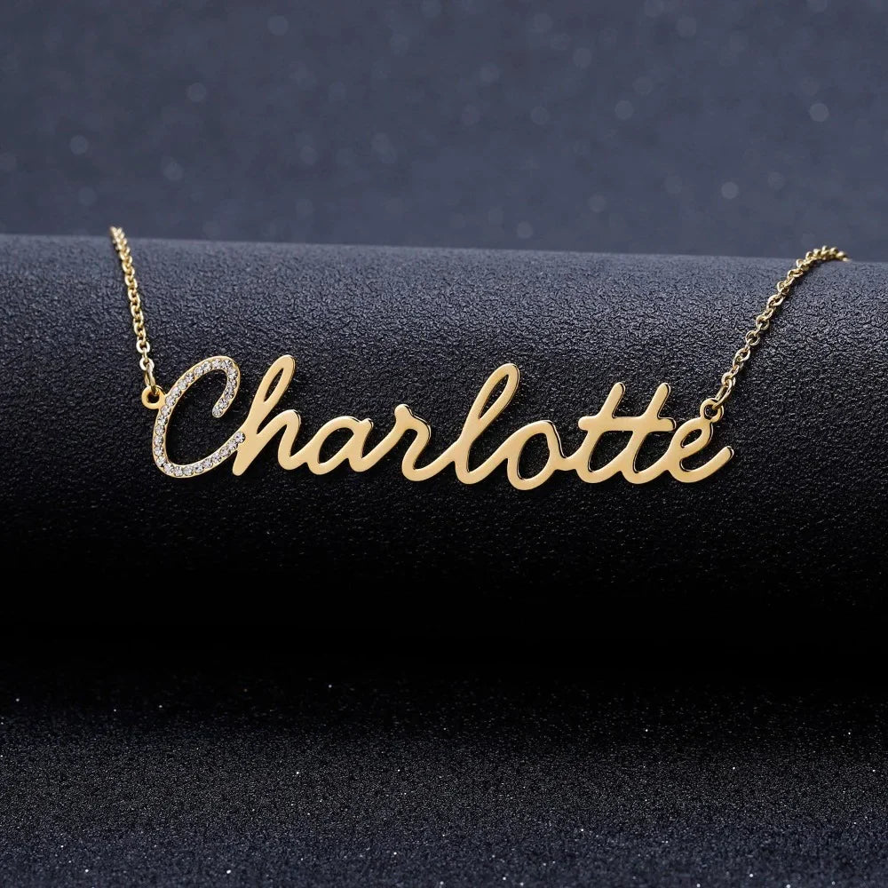 Personalized Gold Iced Initial Name Necklace displayed on black background