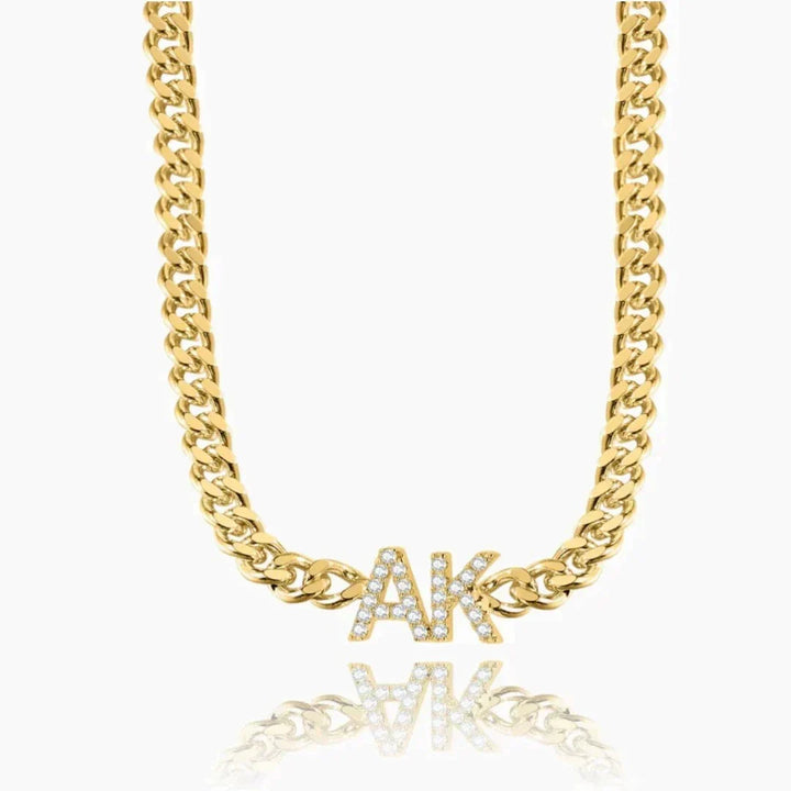 Iced initials necklace with cuban chain in gold, front view