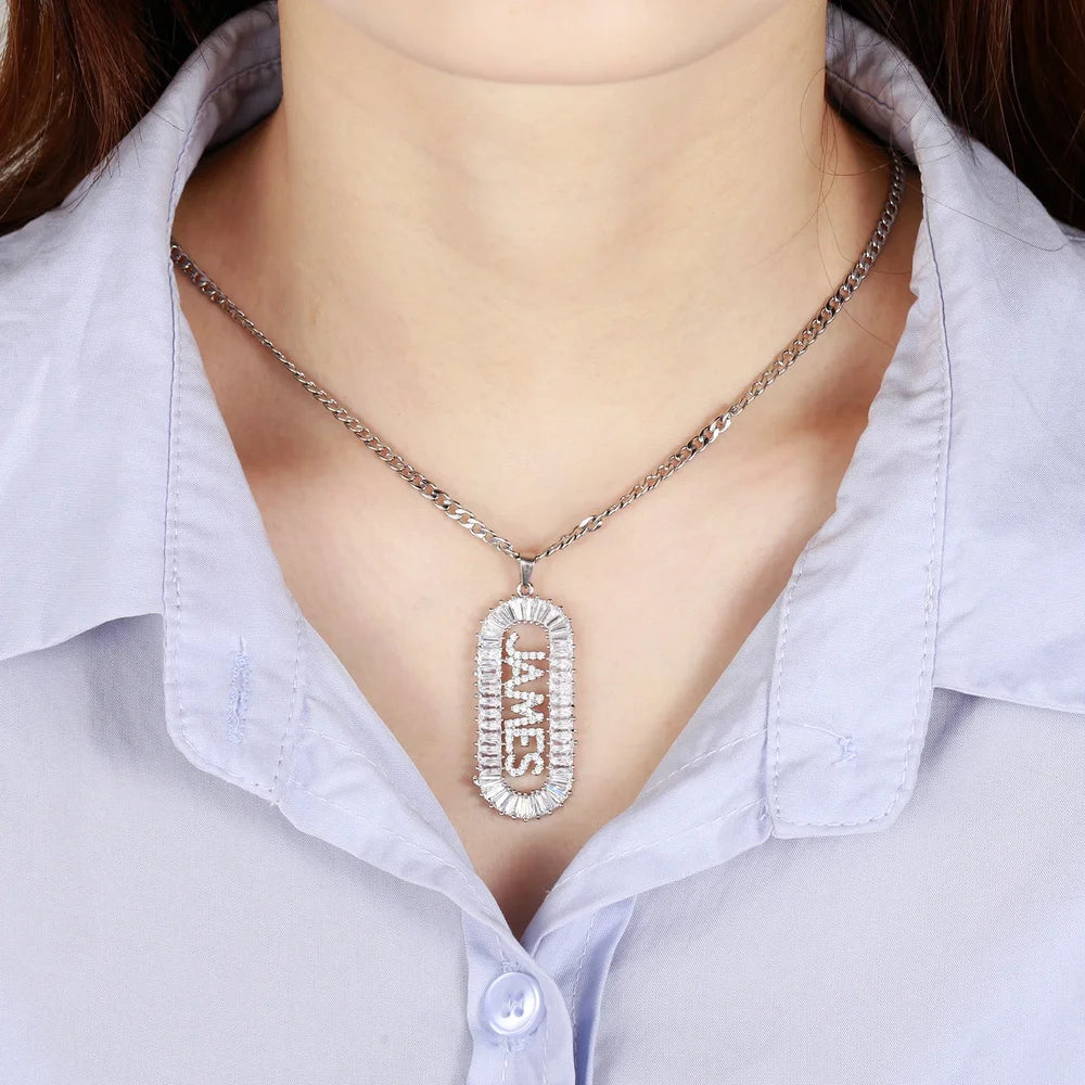 Model wearing Iced Out Vertical Name Necklace in silver