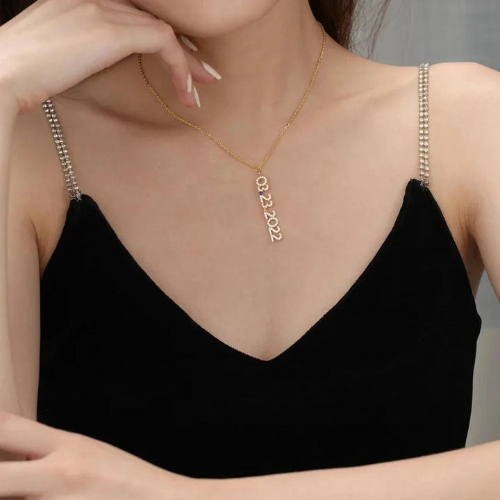 Woman wearing Gold Iced Vertical Date Necklace with link chain