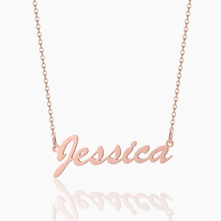 Trendy rose gold personalized cursive name necklace.