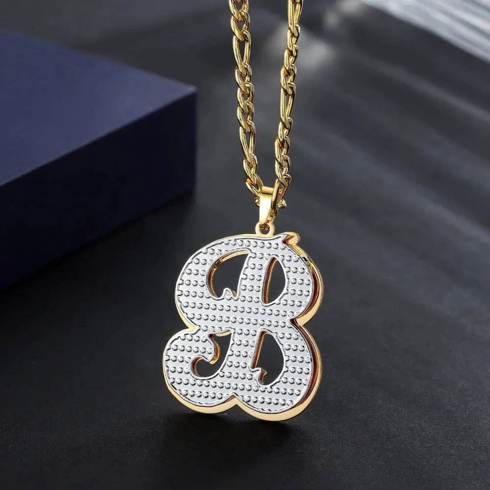 Personalized double plated initial necklace displayed with gold and silver finish.