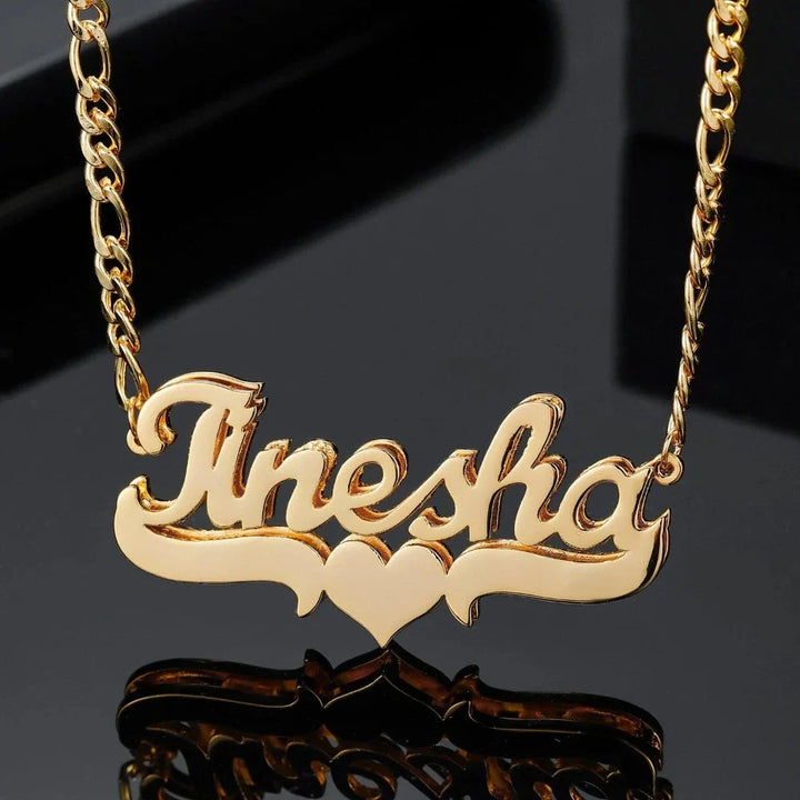 Personalized Heart Name Necklace in 18K Gold on black background