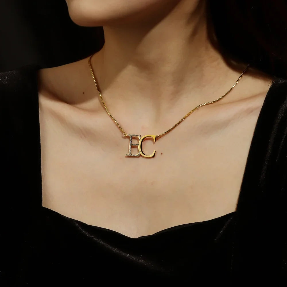 Woman wearing Gold Iced Double Initial Necklace